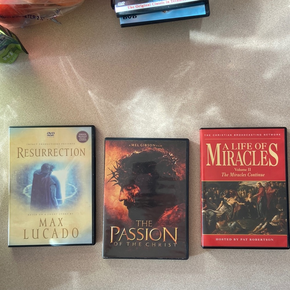 3 DVDs-movies, religious,the Passion the Resurrection, and a life of miracles